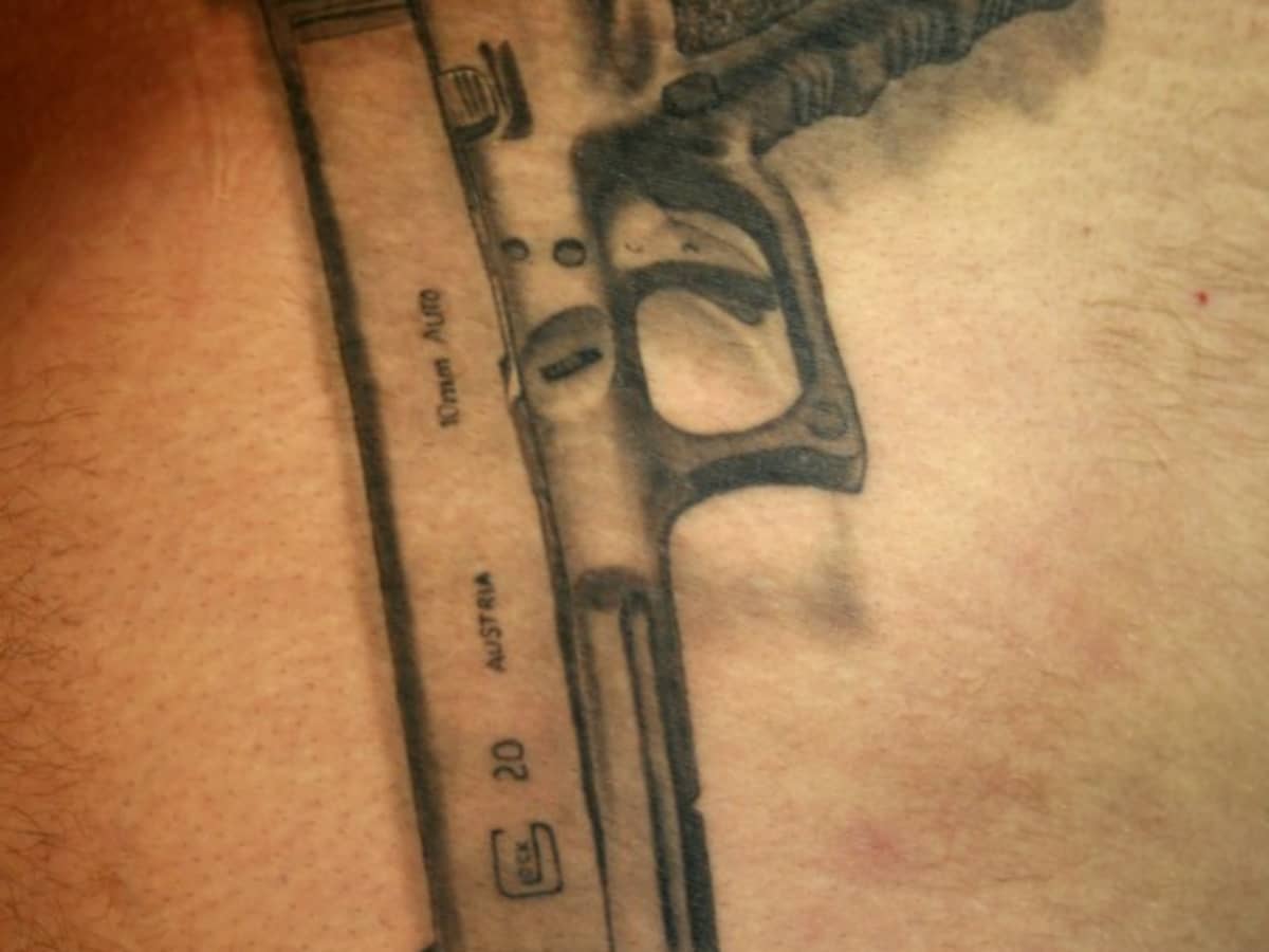 gun tattoos for men 0025