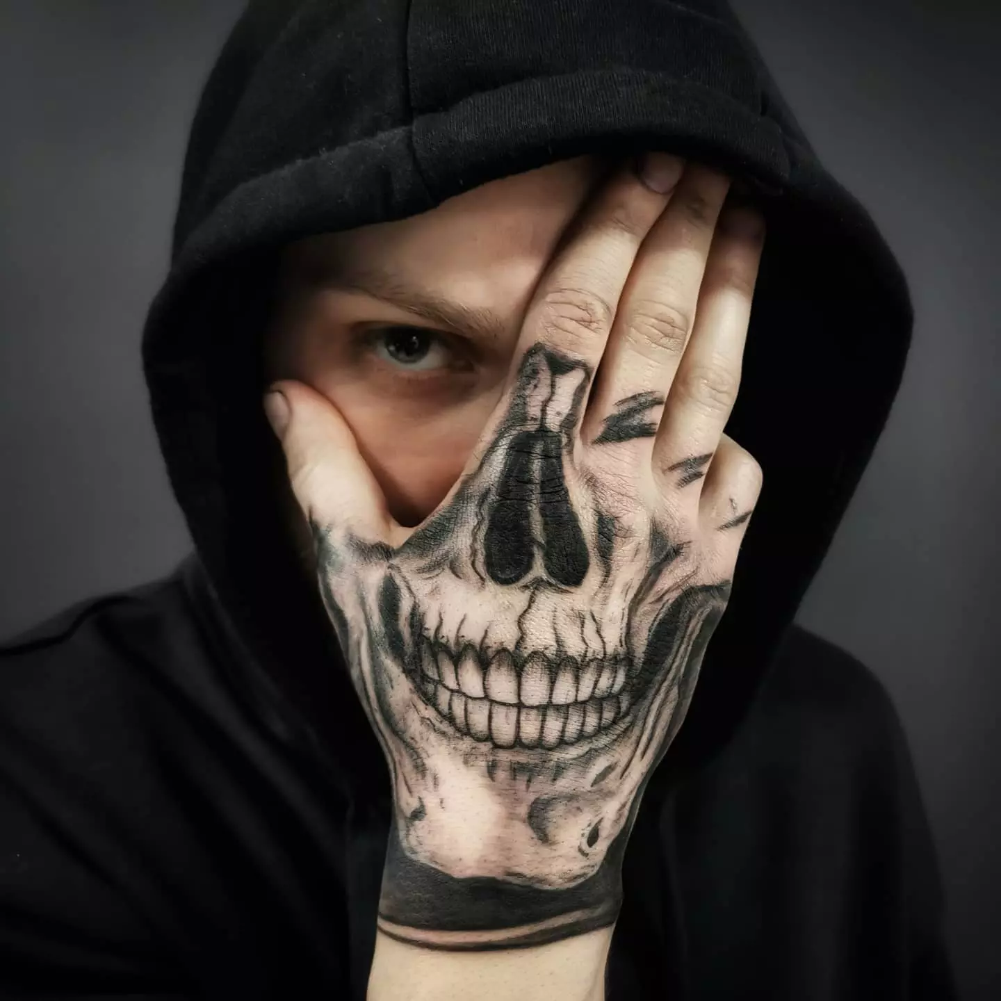 hand tattoos for men skeleton