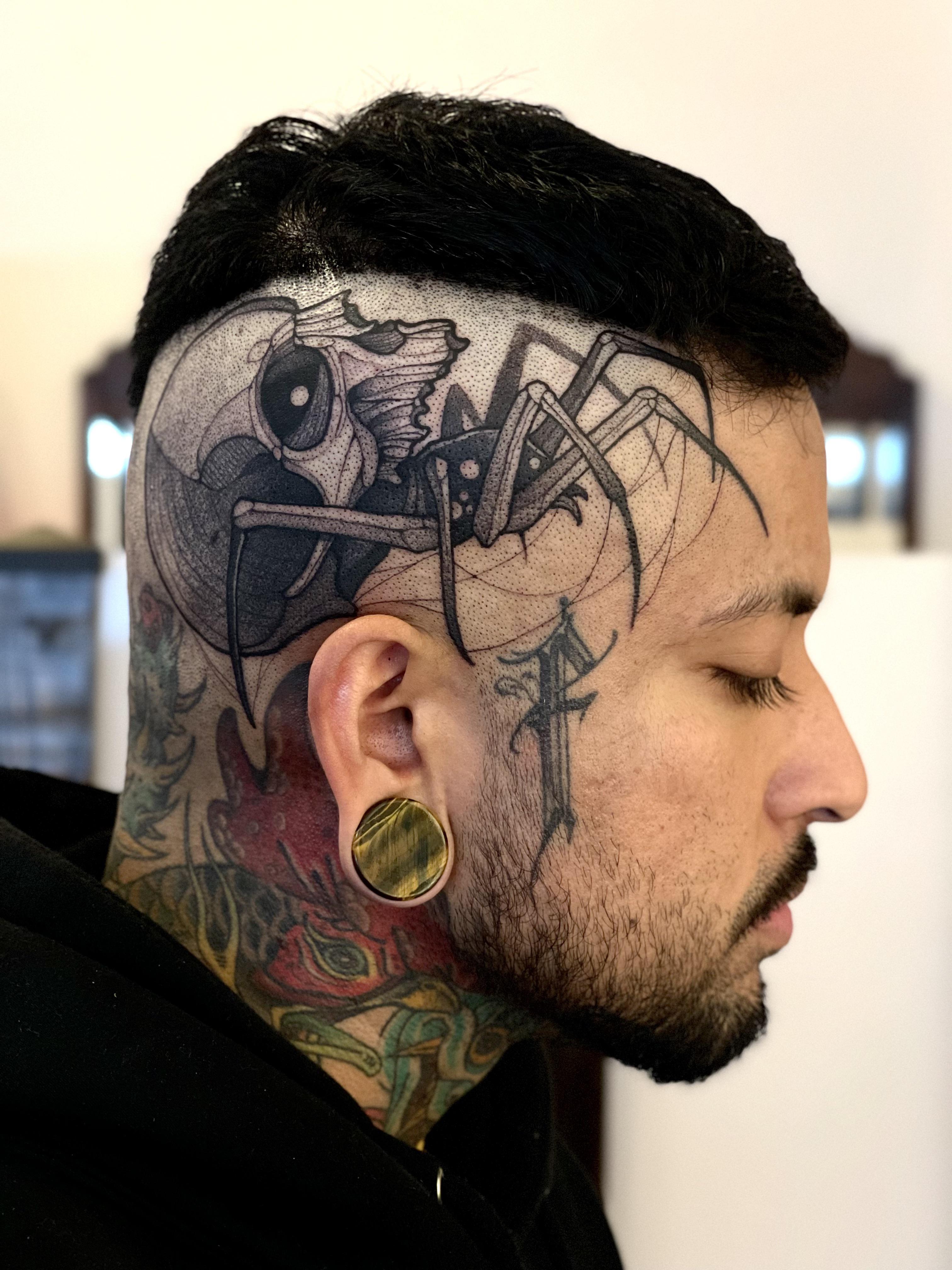 head tattoos for men meaning.