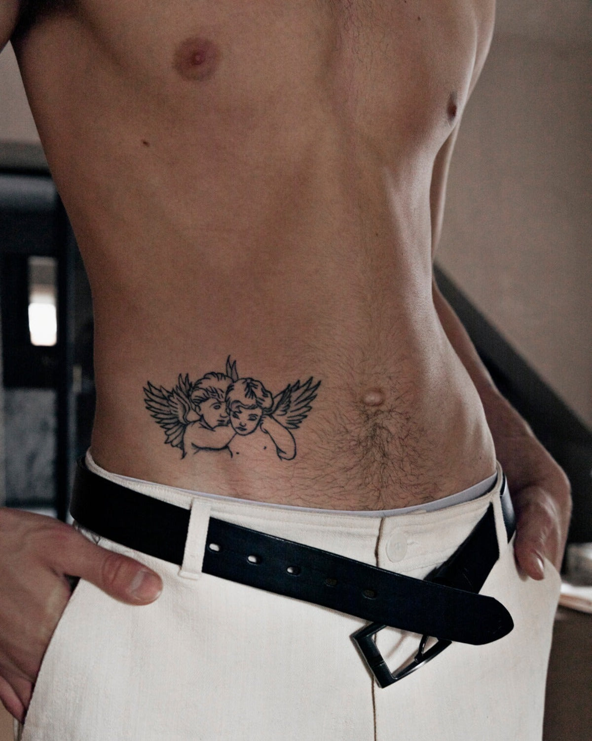 hip tattoos for men 0025