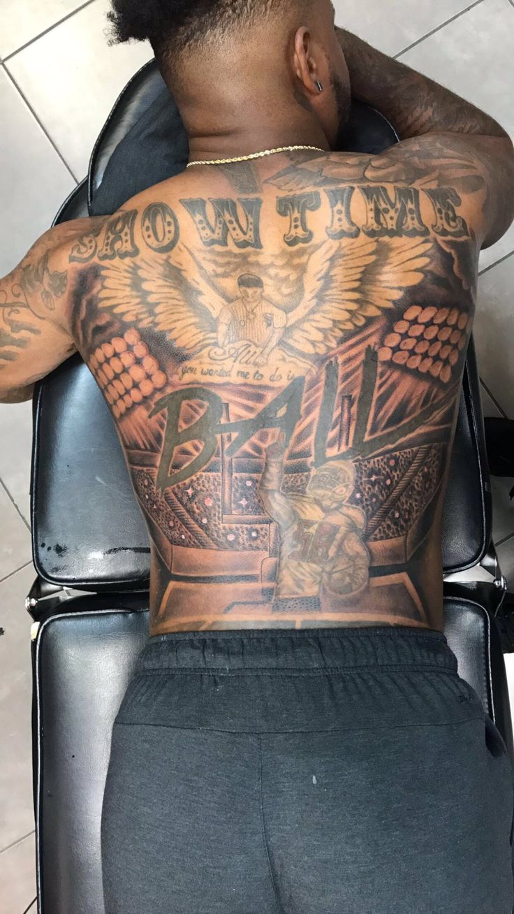 impressive black back tattoos for men