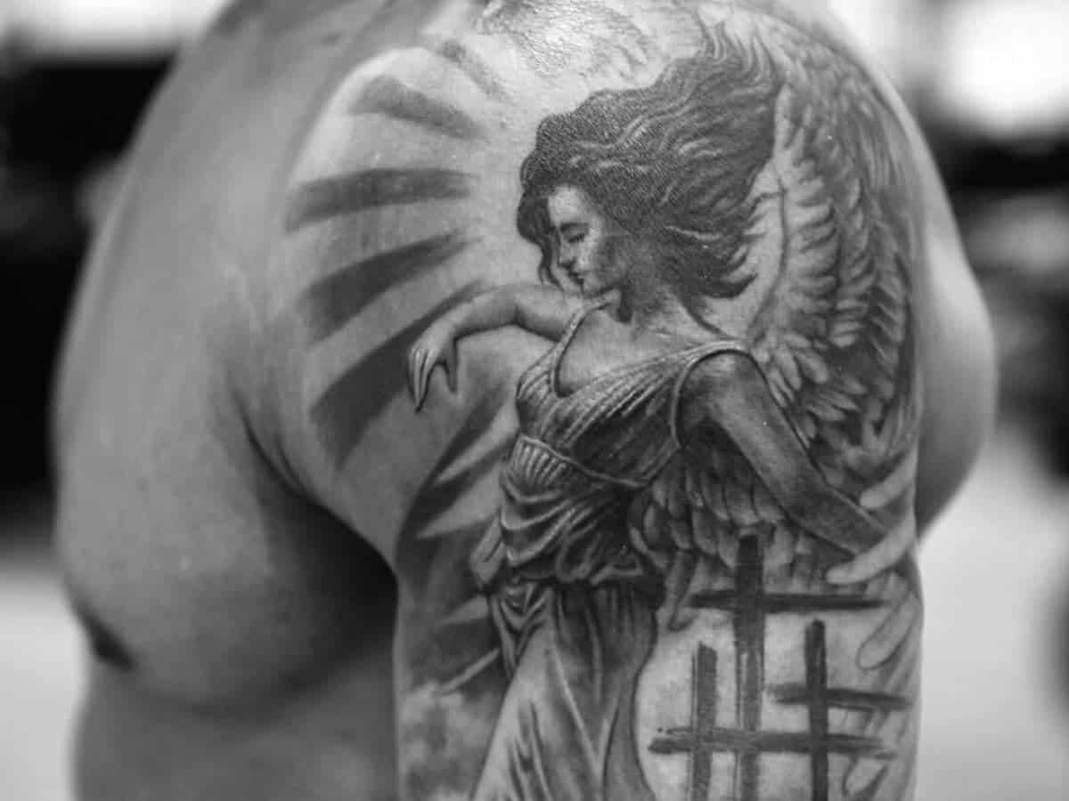 inspiration for religious shoulder tattoos for men