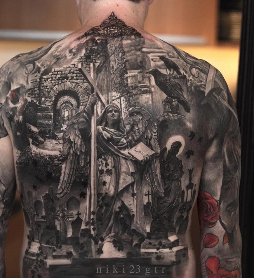 inspirational back tattoos with religious themes for men