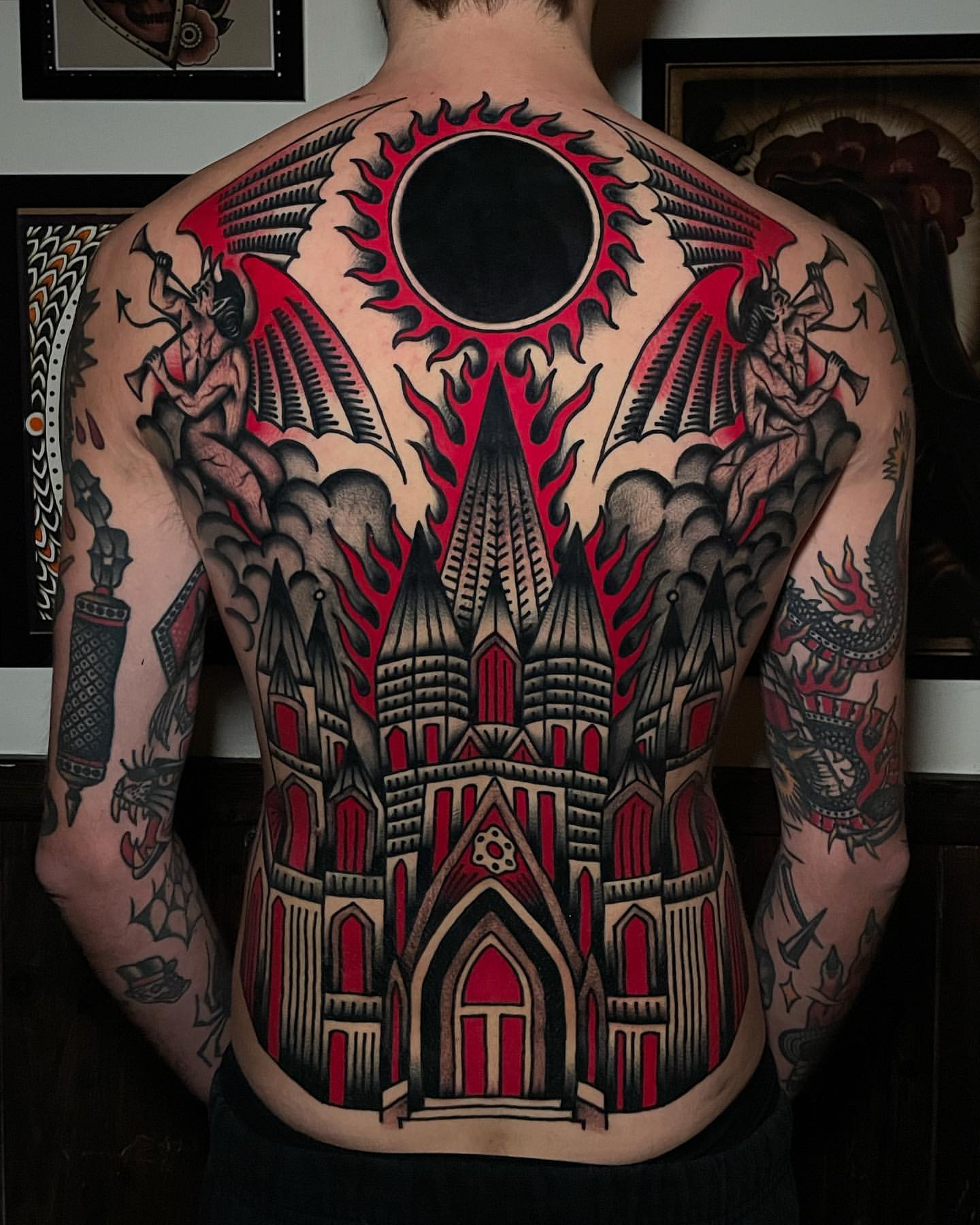 intricate black back tattoos for men