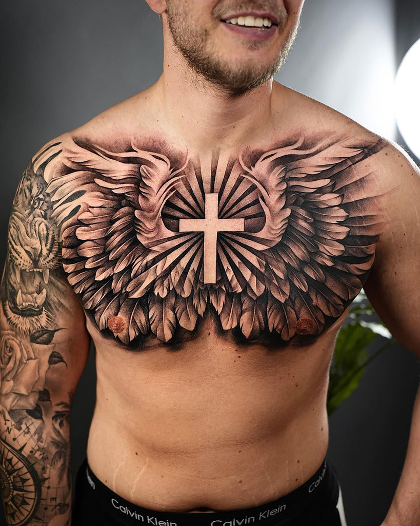 intricate Cross with wings tattoos for men.