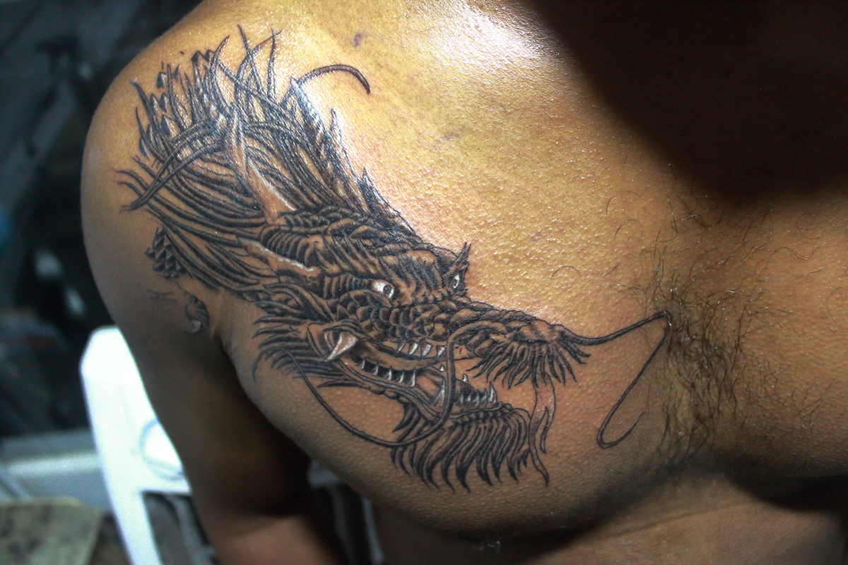 intricate dragon tattoos for men chest patterns