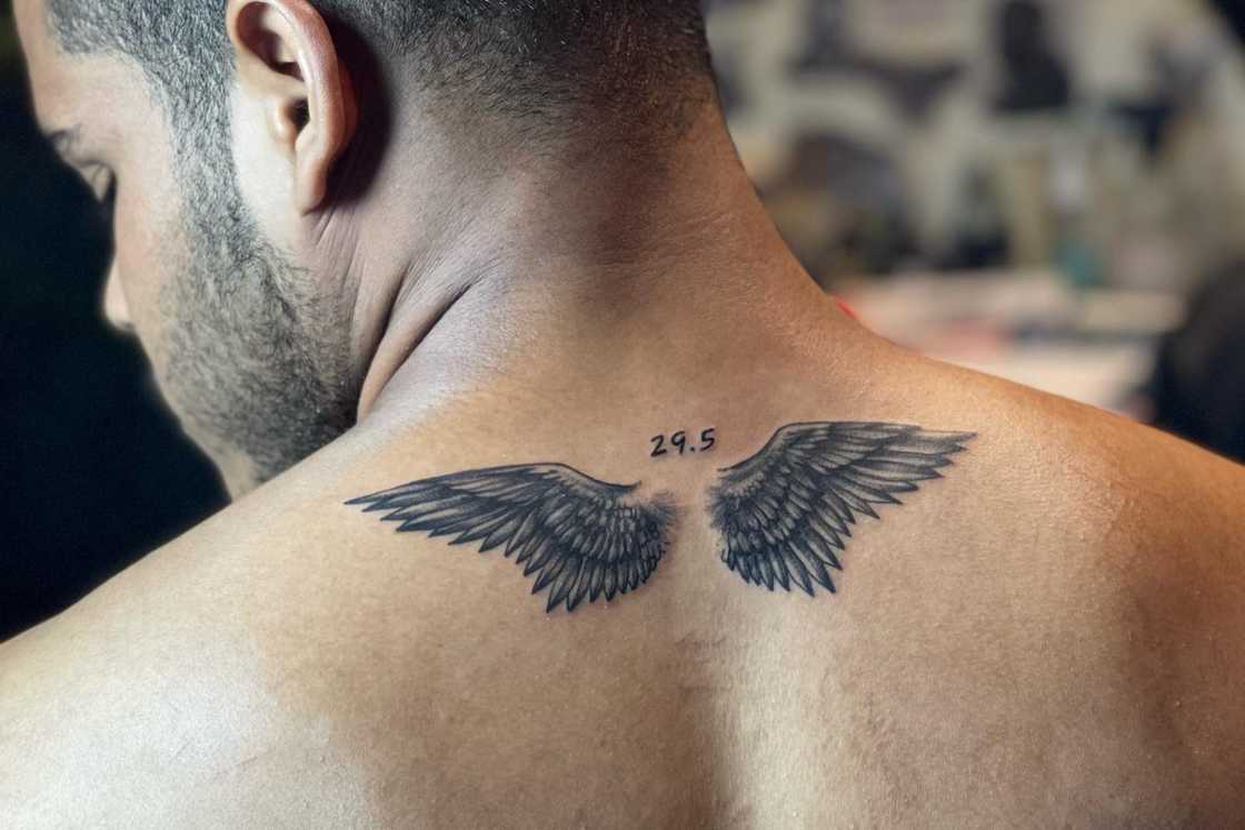 large upper back tattoos for men