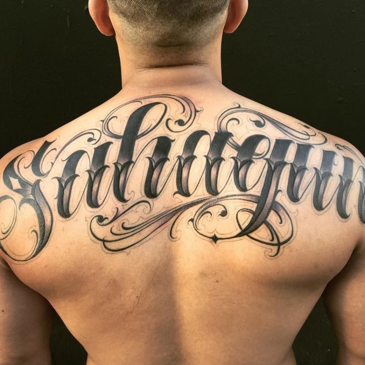 last name back tattoos for men ideas