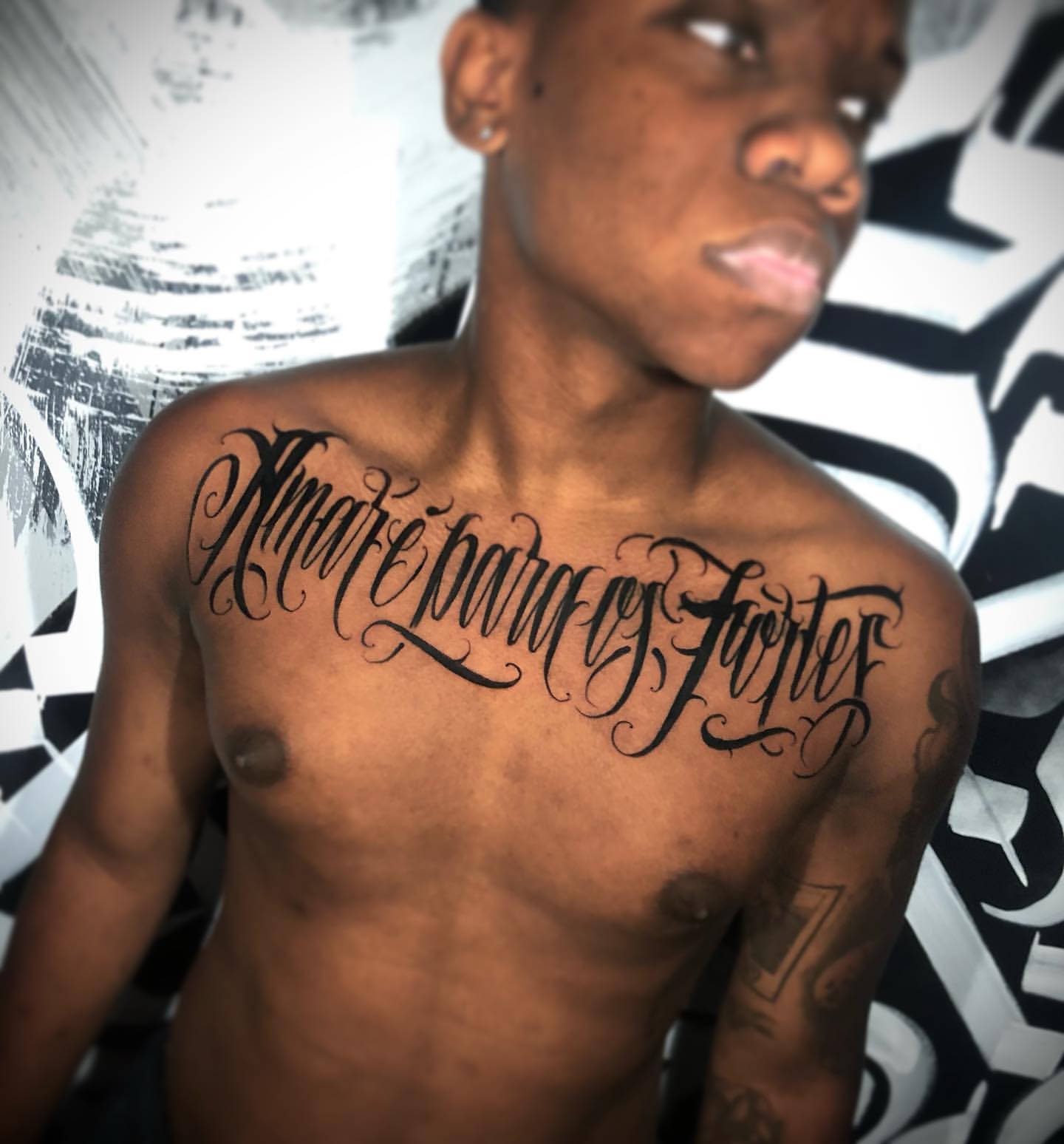 last name back tattoos for men 0022