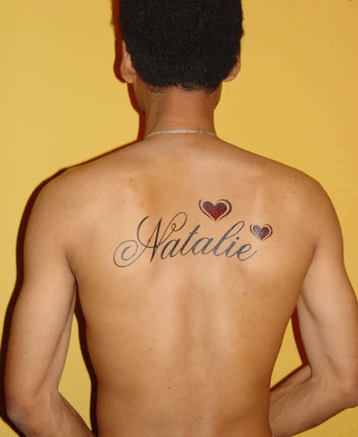 last name back tattoos for men 0030