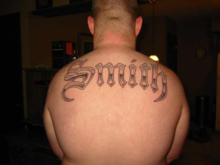 last name back tattoos for men 0076