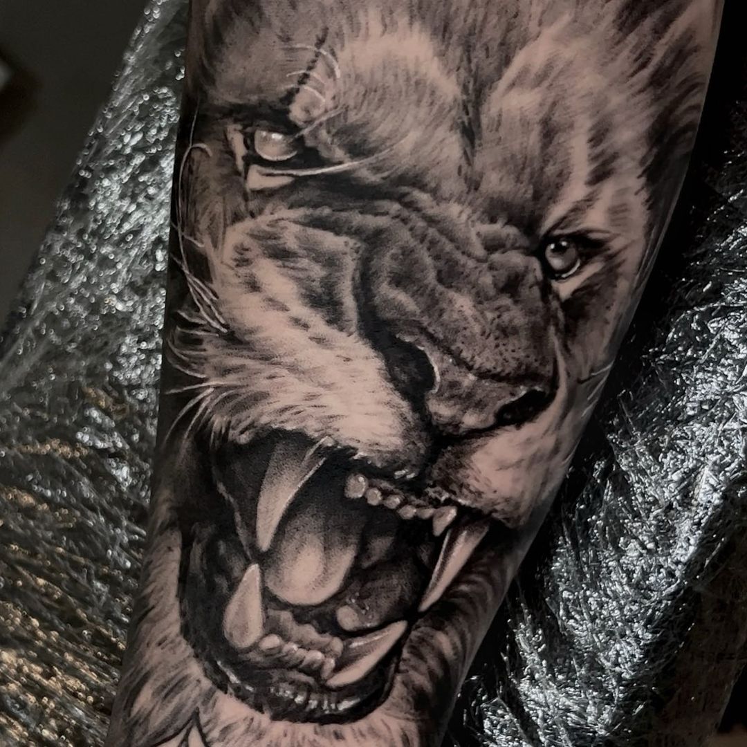 lion forearm tattoos for men 0024