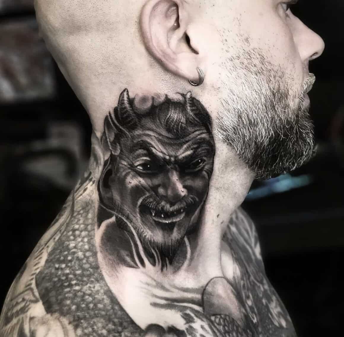 male evil tattoo symbolism