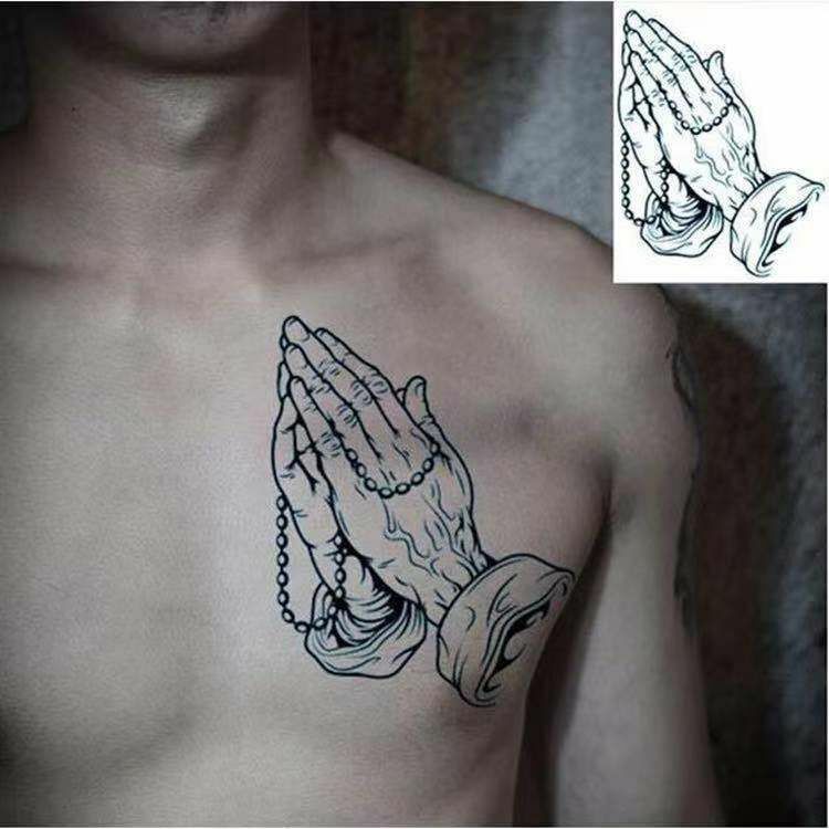 meaning of praying hands tattoo for men