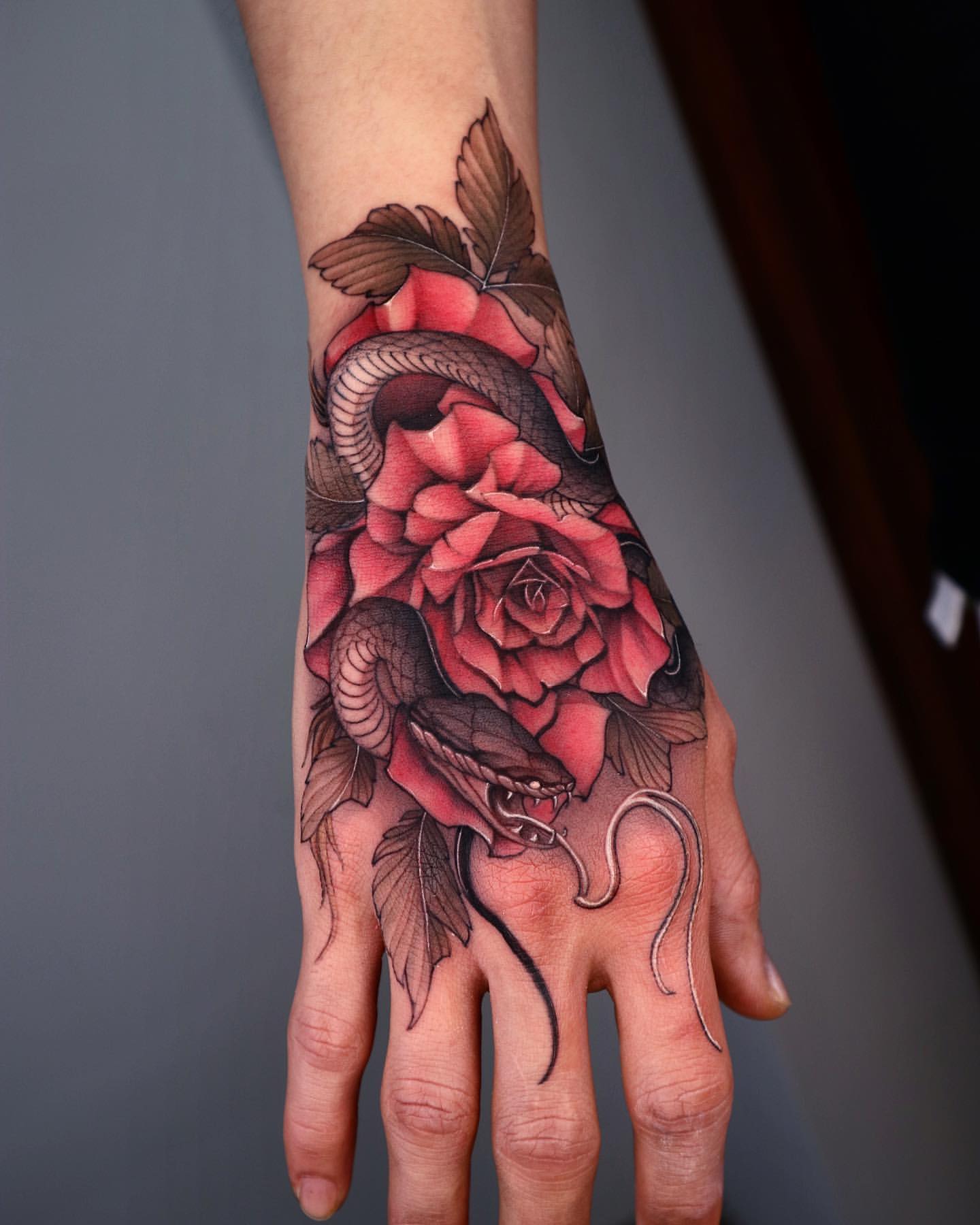 meaning of rose tattoos for men on hand