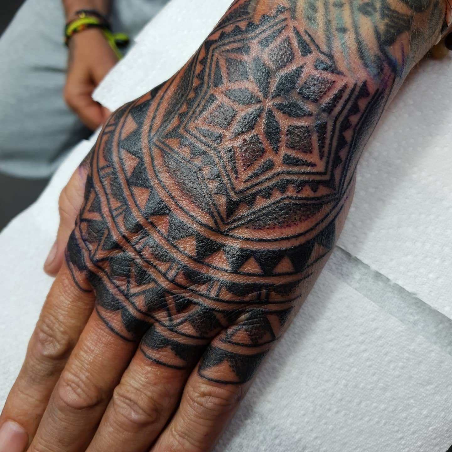 meaning of tribal hand tattoos for men