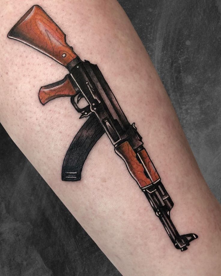 meaningful ak 47 tattoos for men symbolism