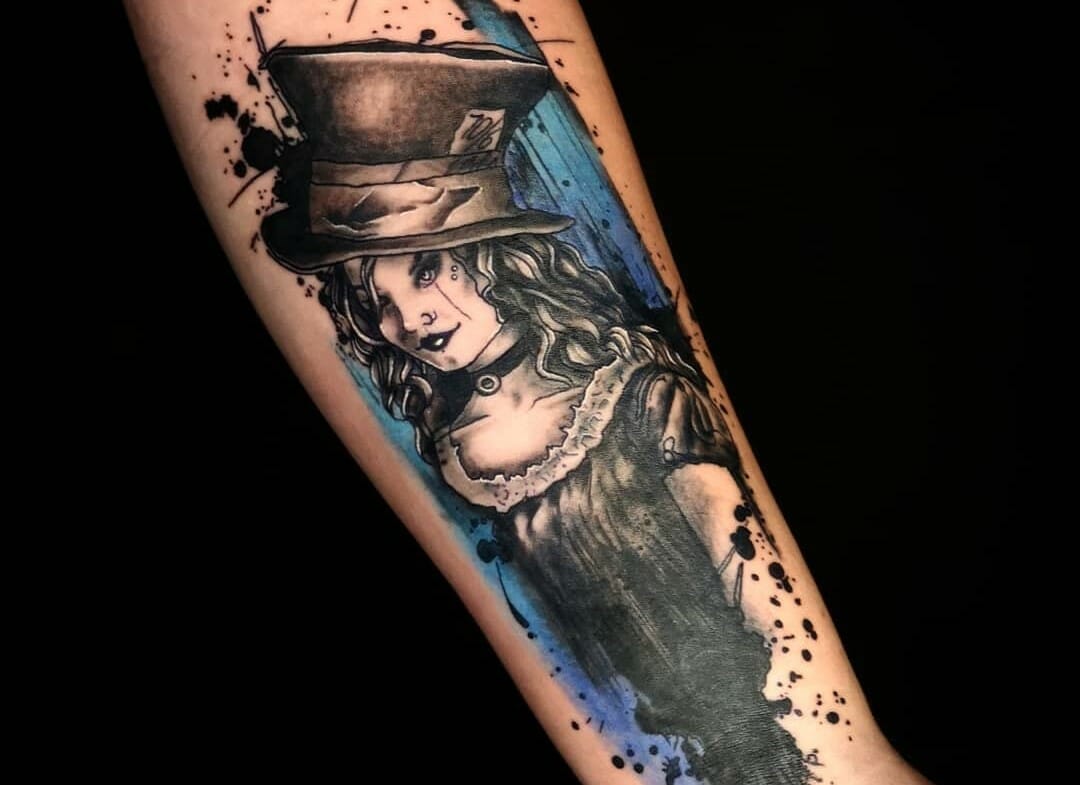 meaningful Alice in Wonderland tattoos for men