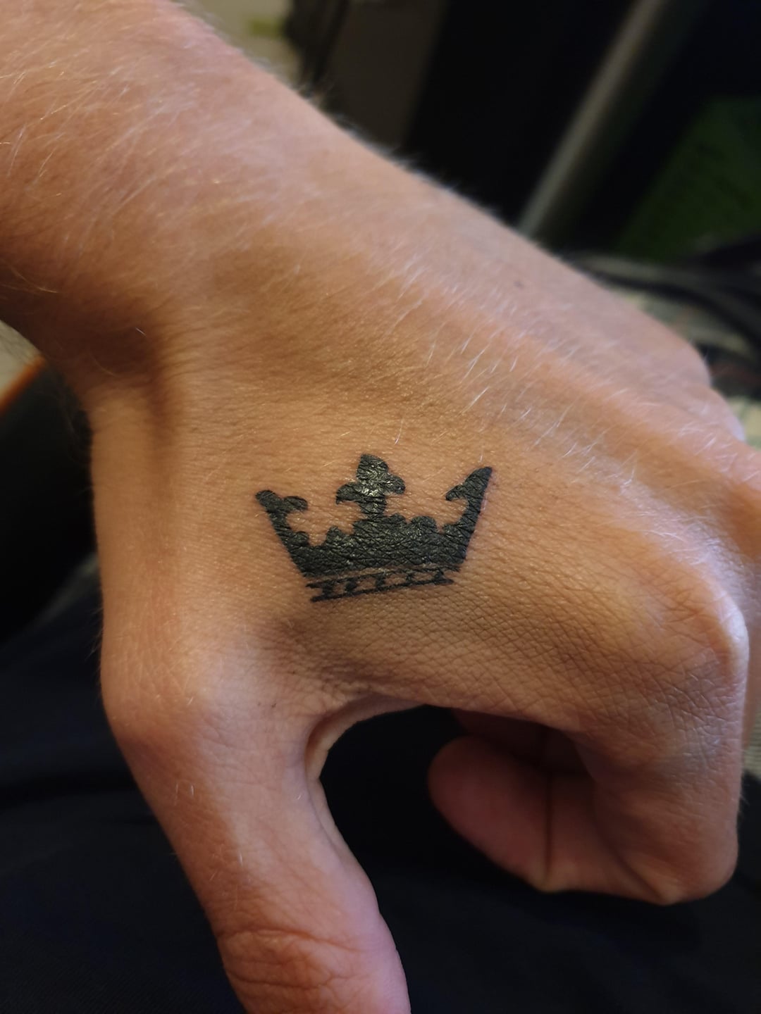 meaningful Crown tattoo designs for men