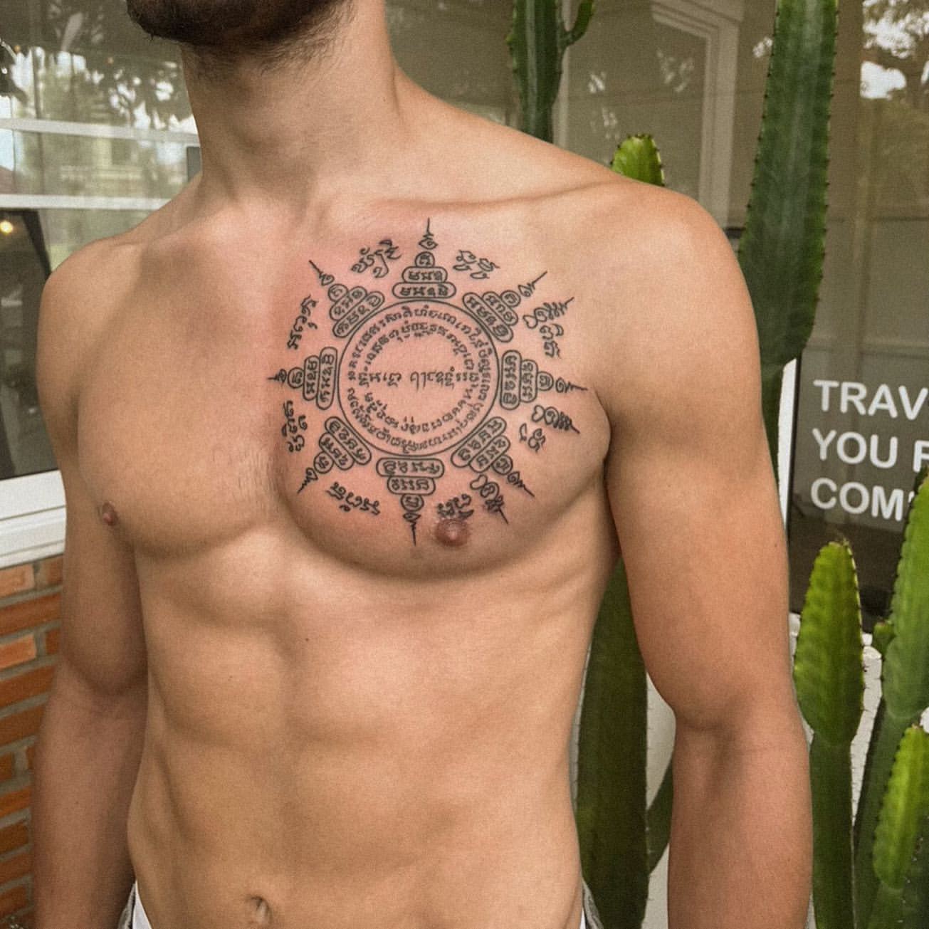 meaningful family chest tattoos for men 0030