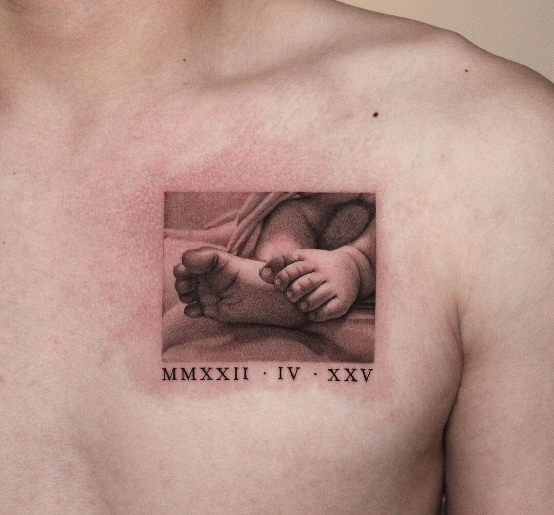 meaningful family chest tattoos for men 0035