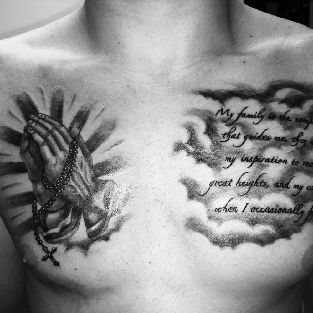 meaningful family chest tattoos for men 0053