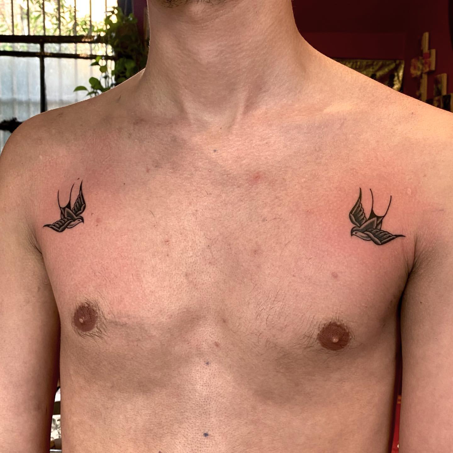 meaningful family chest tattoos for men 0069