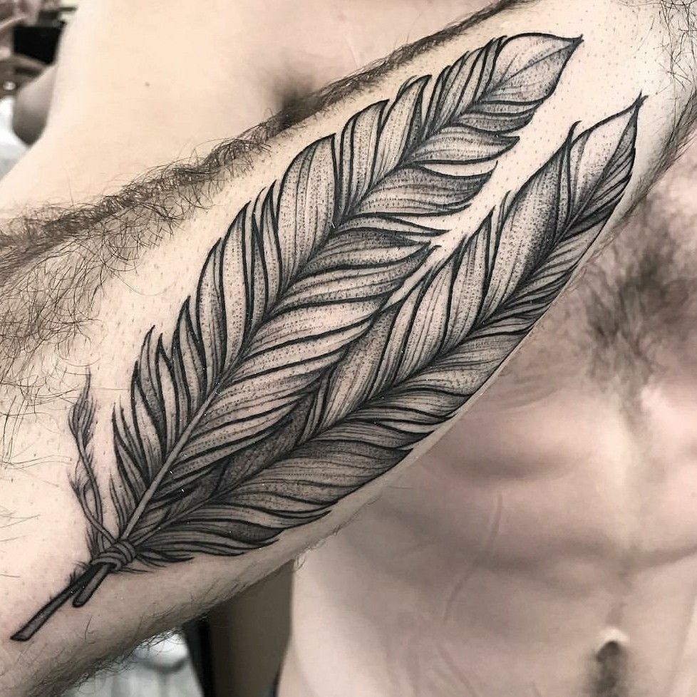 meaningful feather tattoos for men