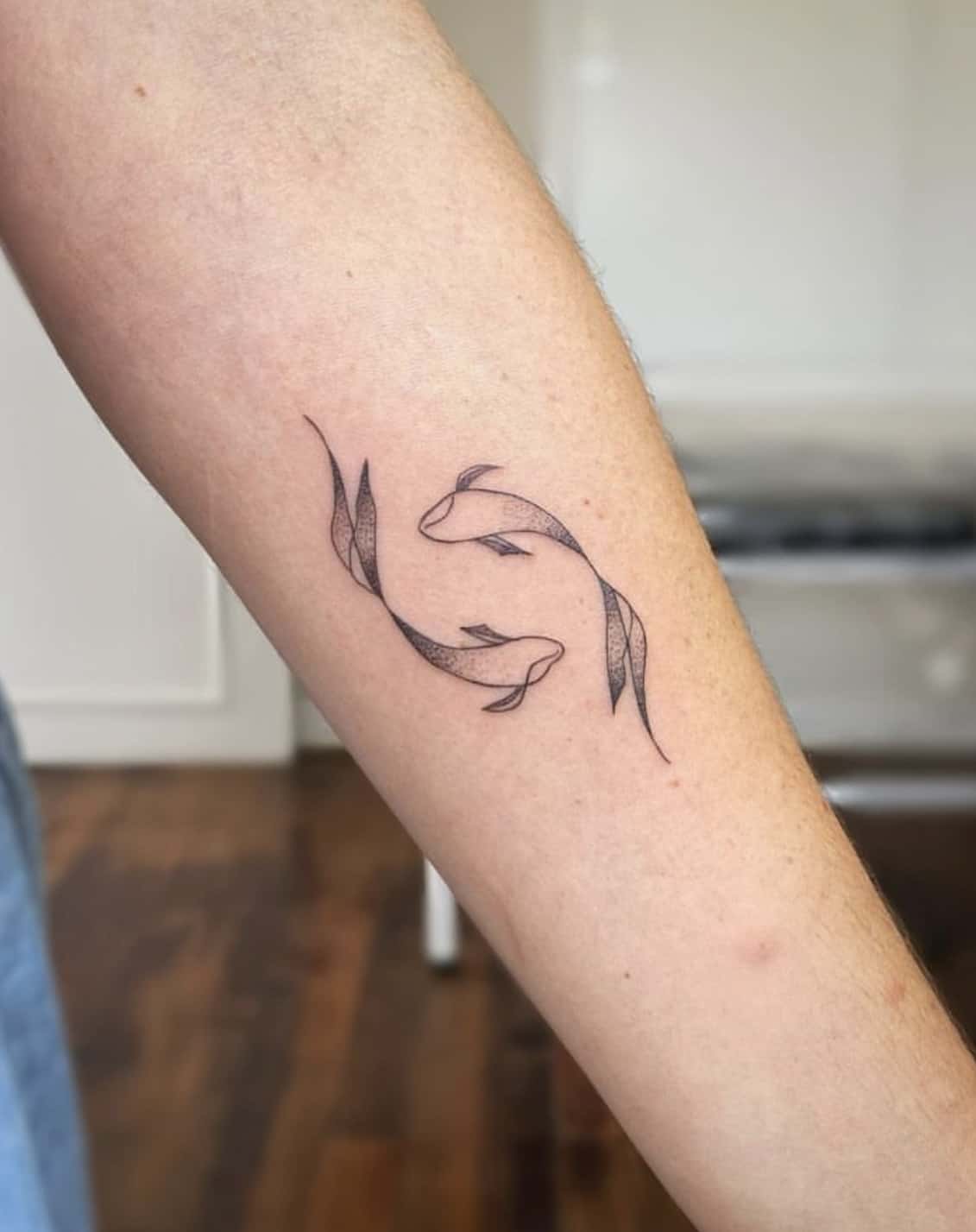 meaningful Pisces tattoos for men