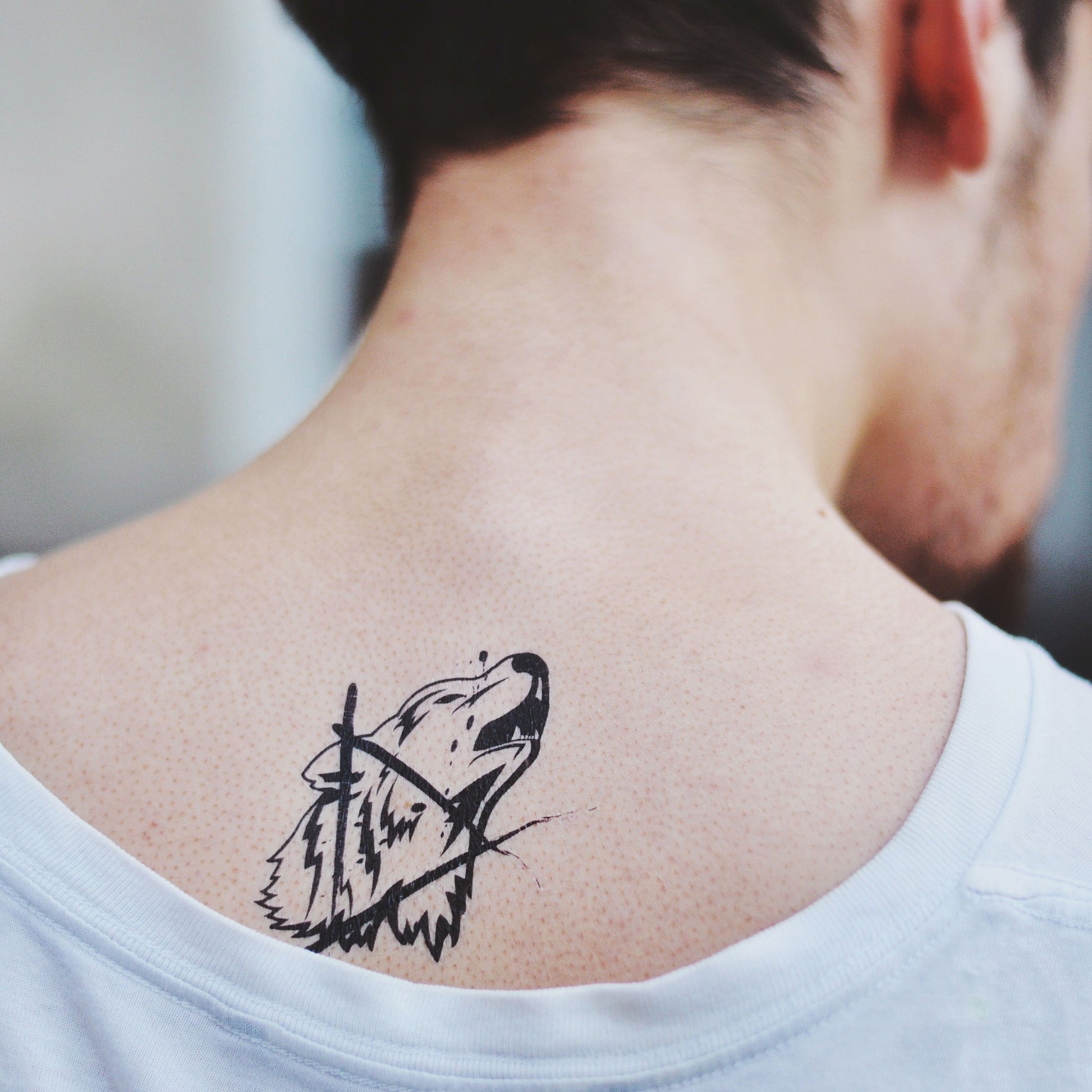 meaningful small animal tattoos for men