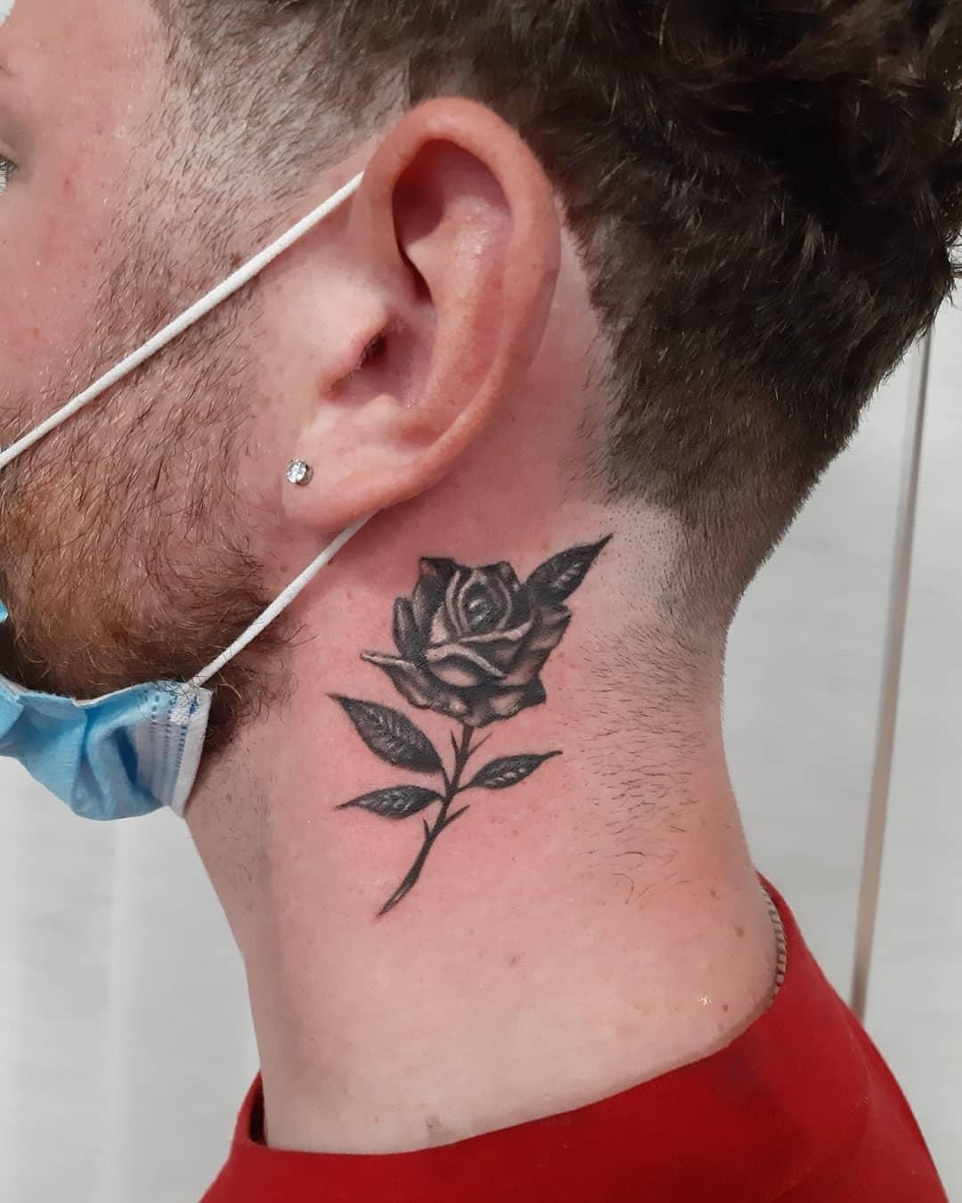 meaningful small neck tattoos for men