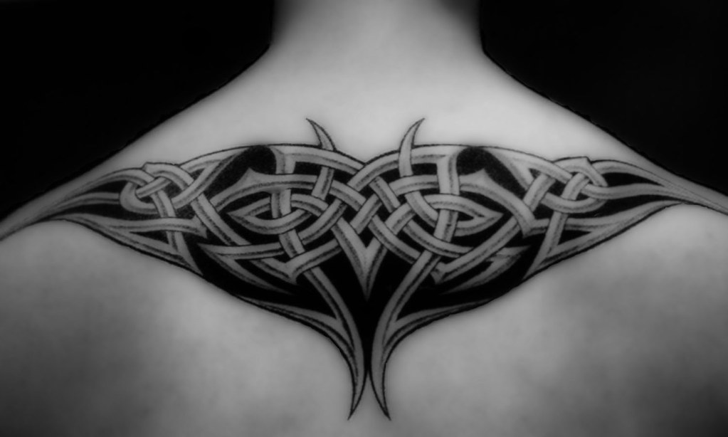 meaningful upper back tattoo cover up ideas for men