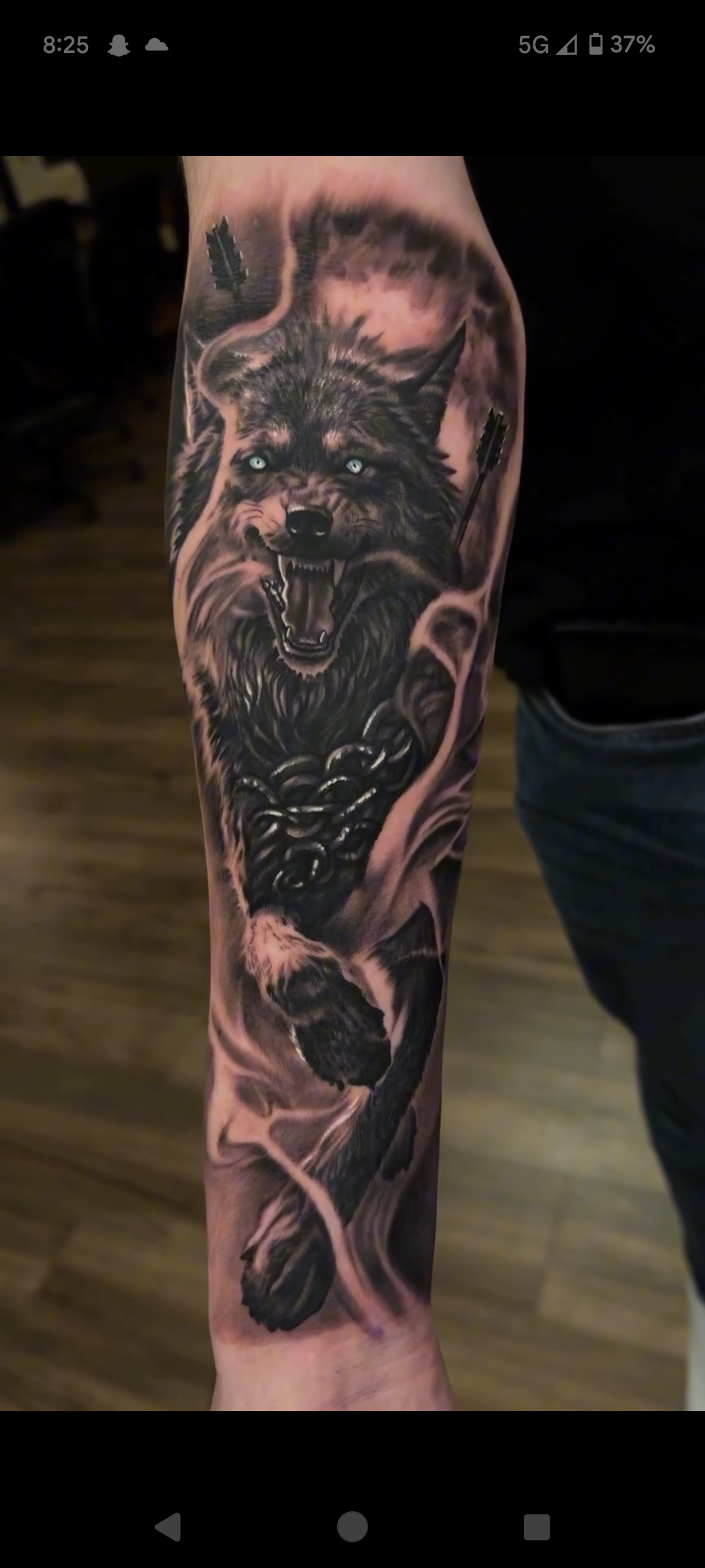 meaningful wolf forearm tattoos for men