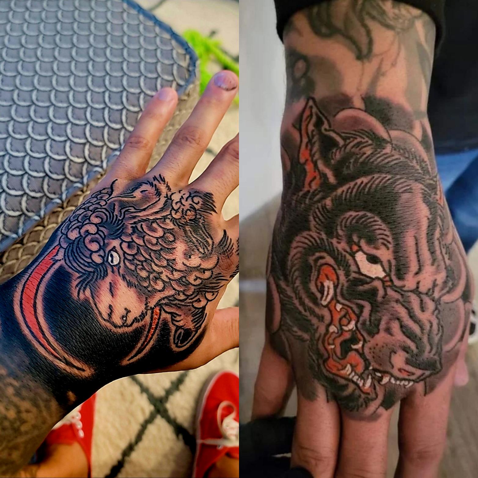 meaningful wolf hand tattoos for men