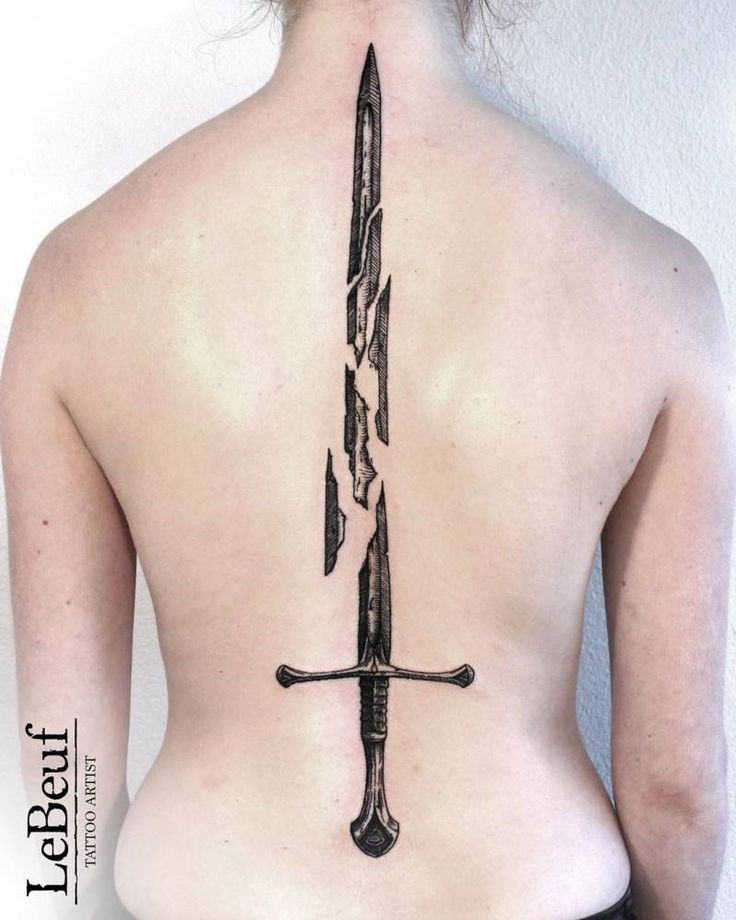 men's back tattoos with sword symbolism