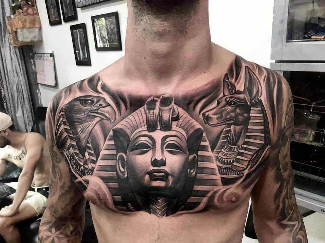 men’s black Egyptian chest tattoo designs