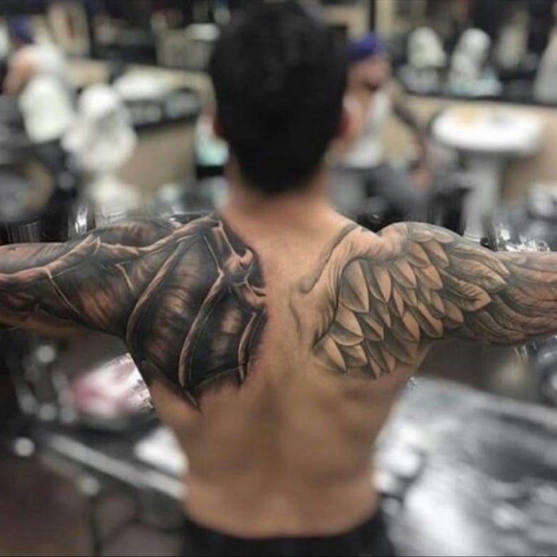 mens wing tattoo for the back 0025