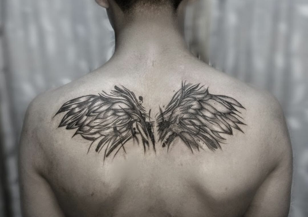 mens wing tattoo for the back 0036