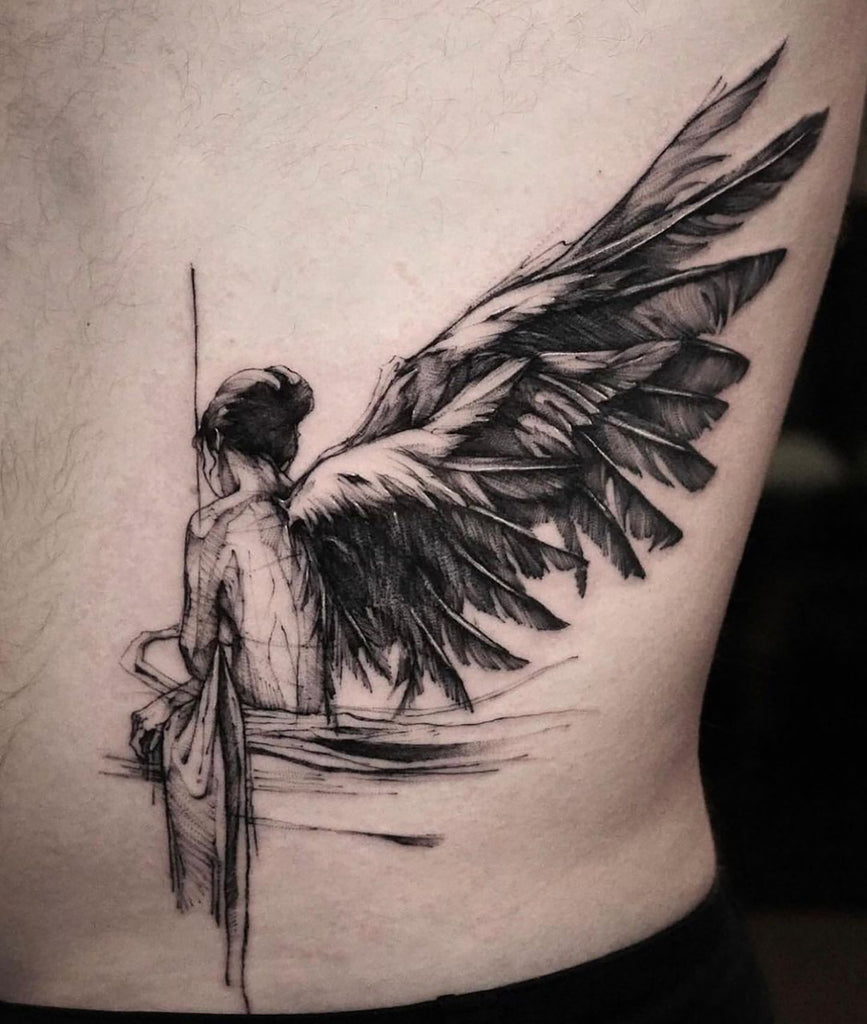 mens wing tattoo for the back 0055