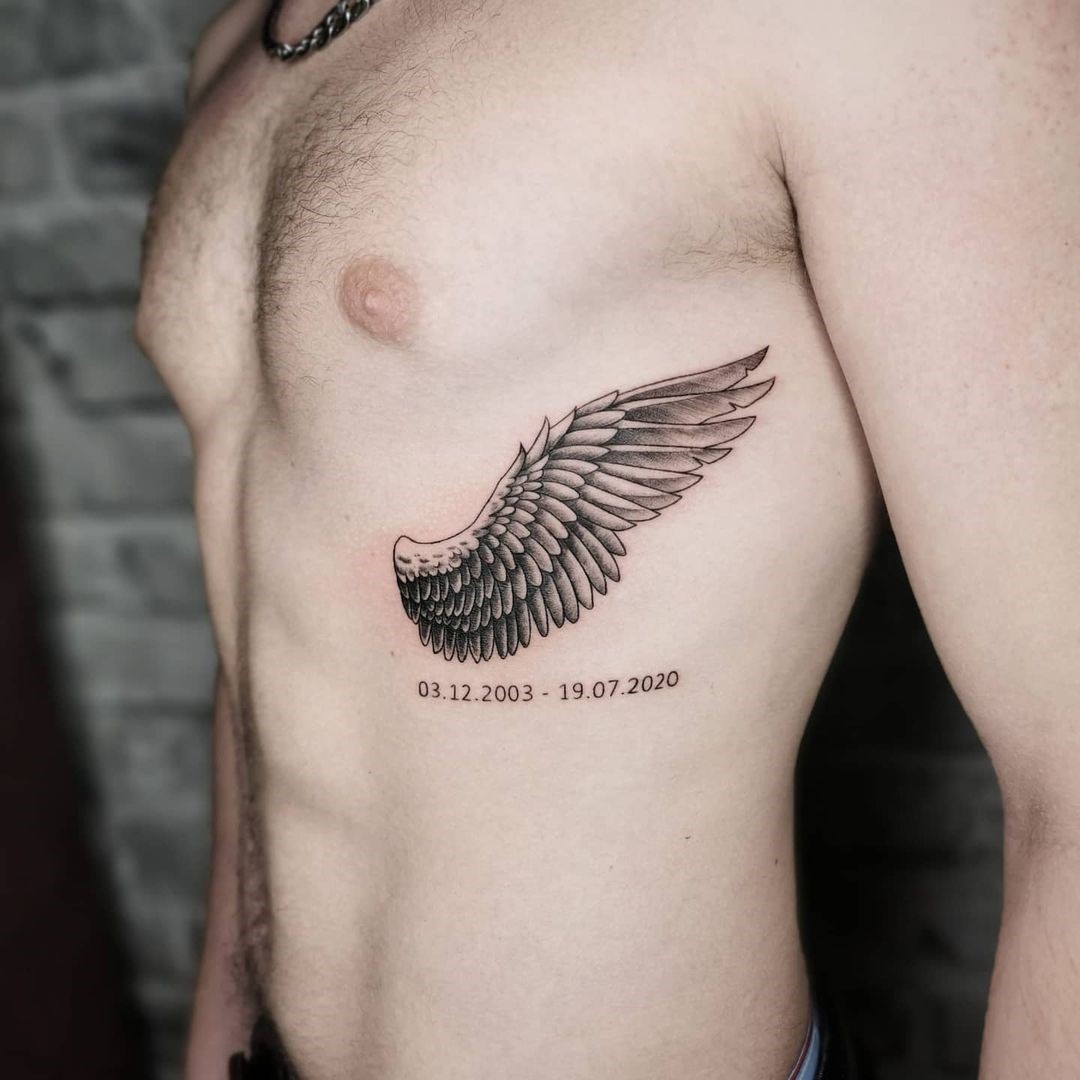 mens wing tattoo for the back 0058