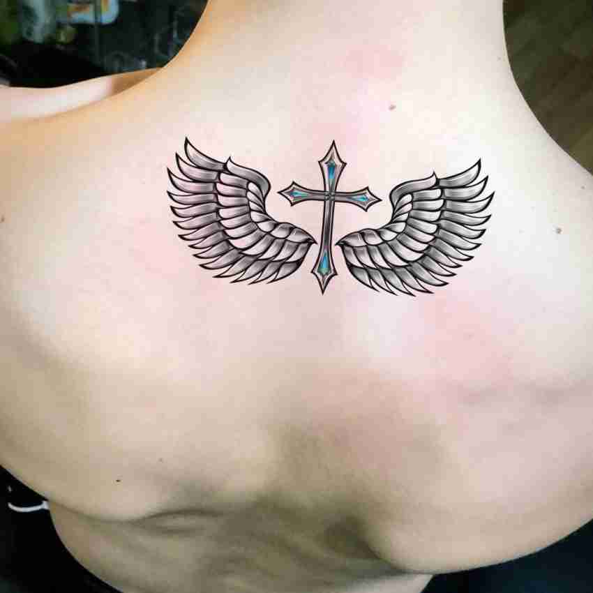 mens wing tattoo for the back 0061