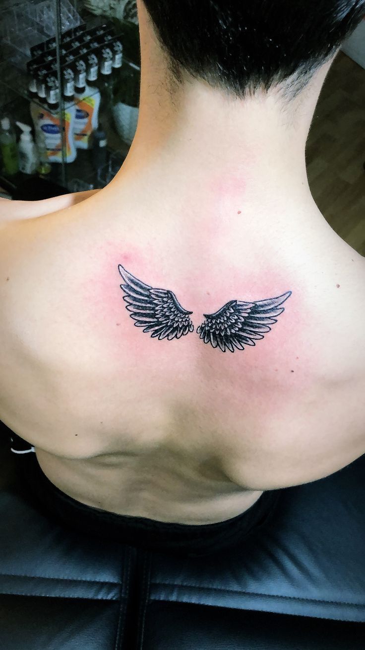 mens wing tattoo for the back 0066