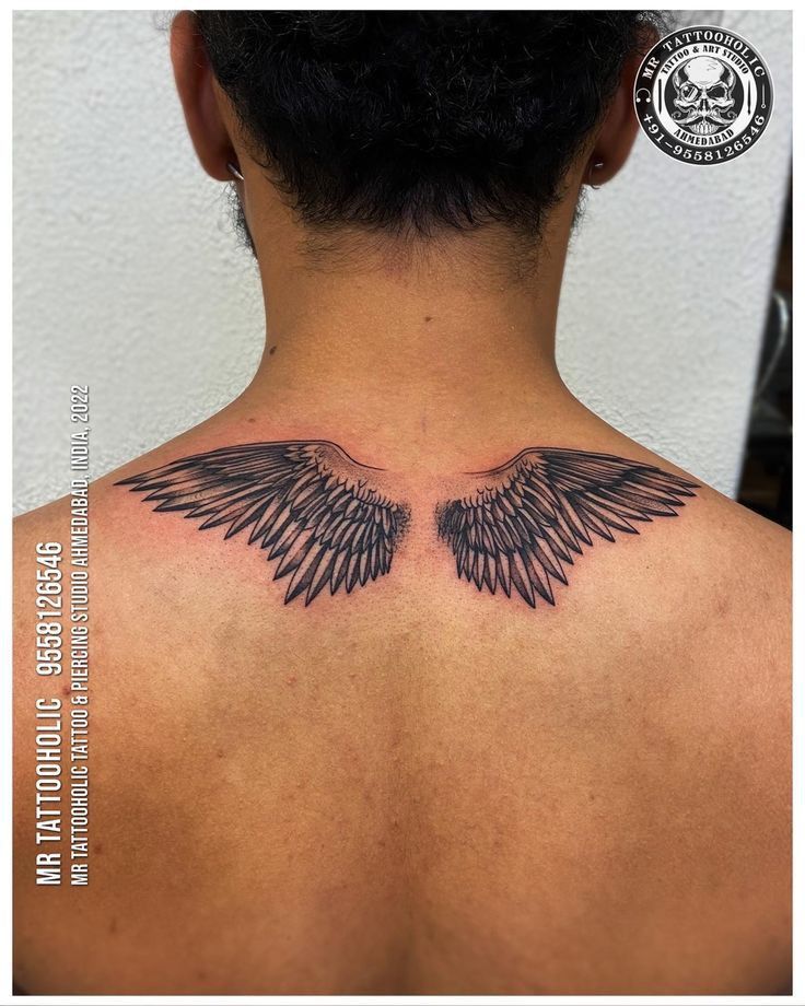 mens wing tattoo for the back 0076