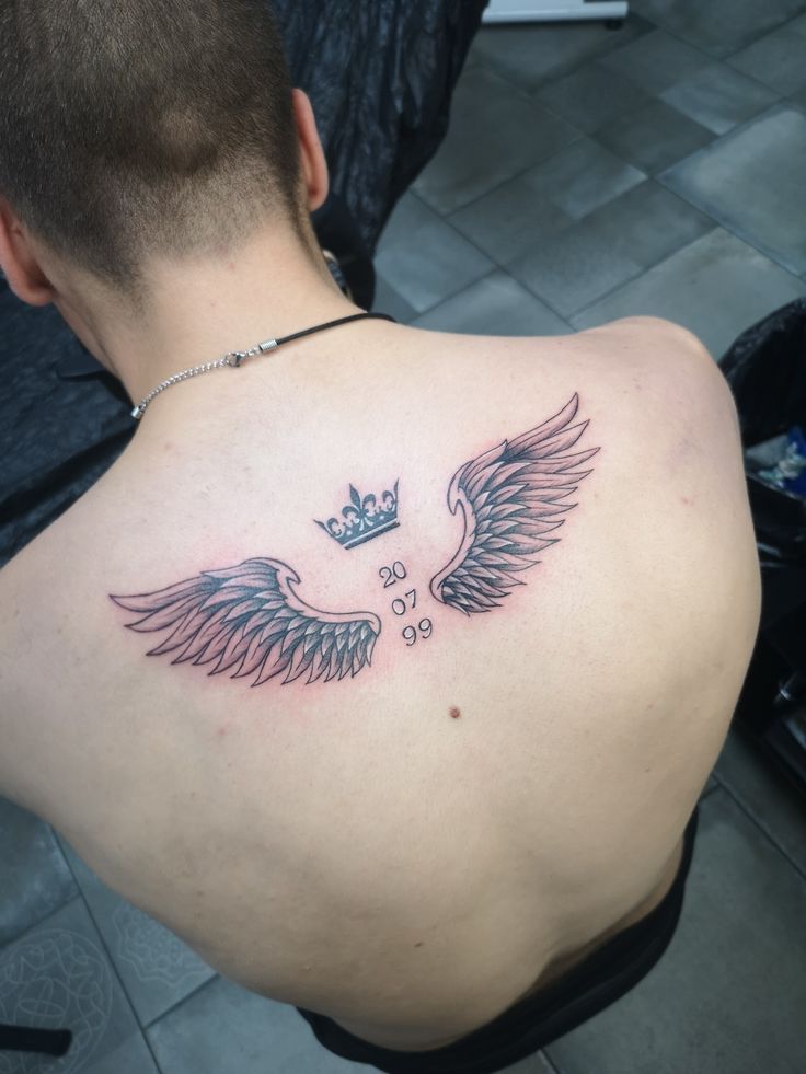 mens wing tattoo for the back 0086