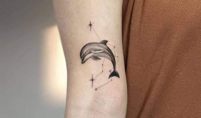 minimalist dolphin tattoo for men