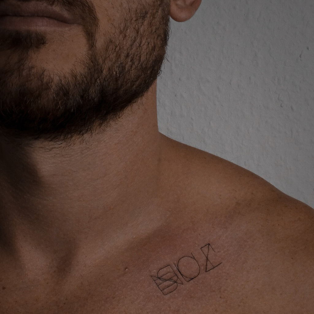 minimalist tattoos for men 0058