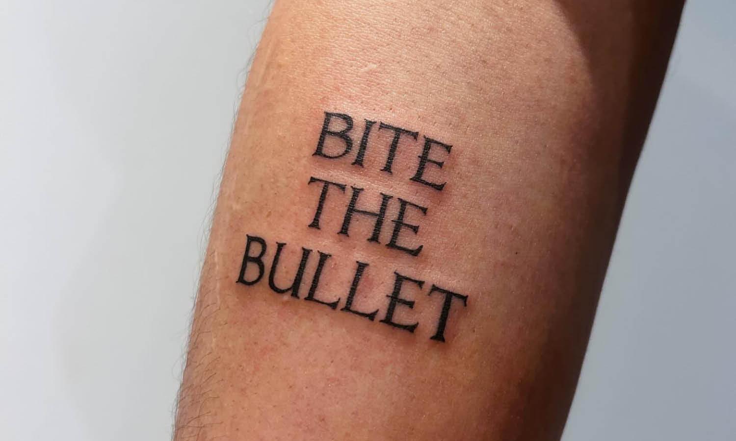 modern forearm quote tattoos for men.