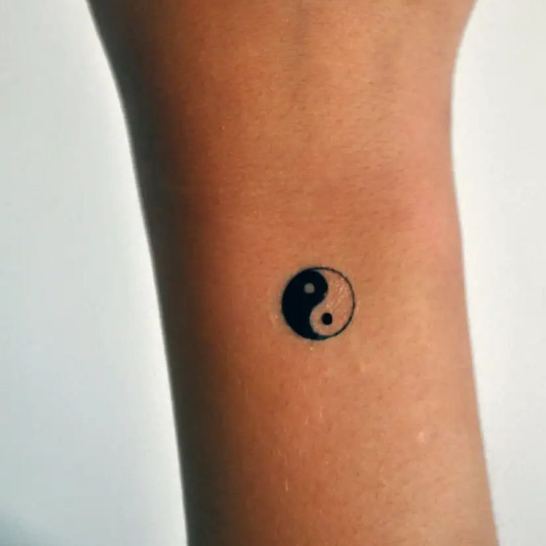 modern interpretations of Yin Yang tattoos for men