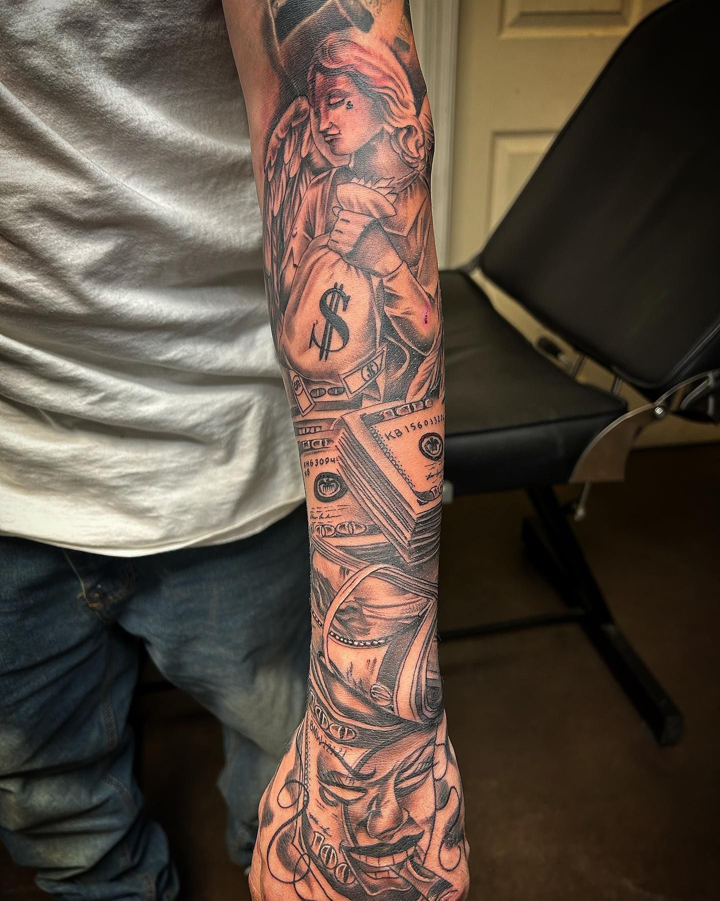 money outer forearm tattoo designs