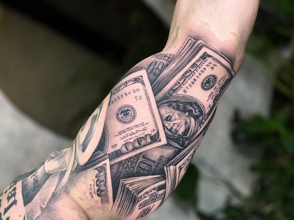 money outer forearm tattoos for men 0011